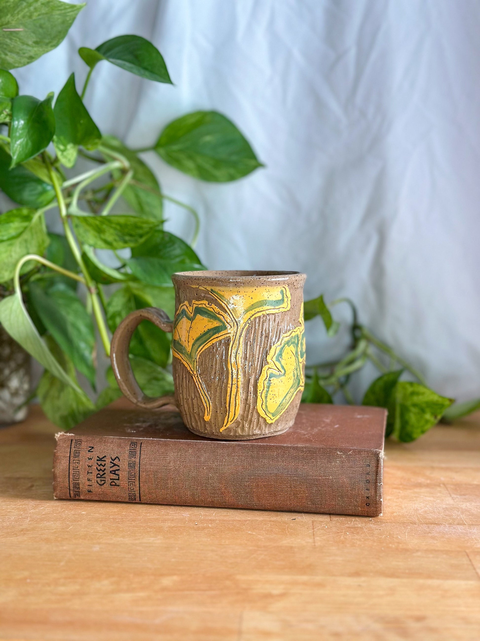 mug with ginkgo leaves on it