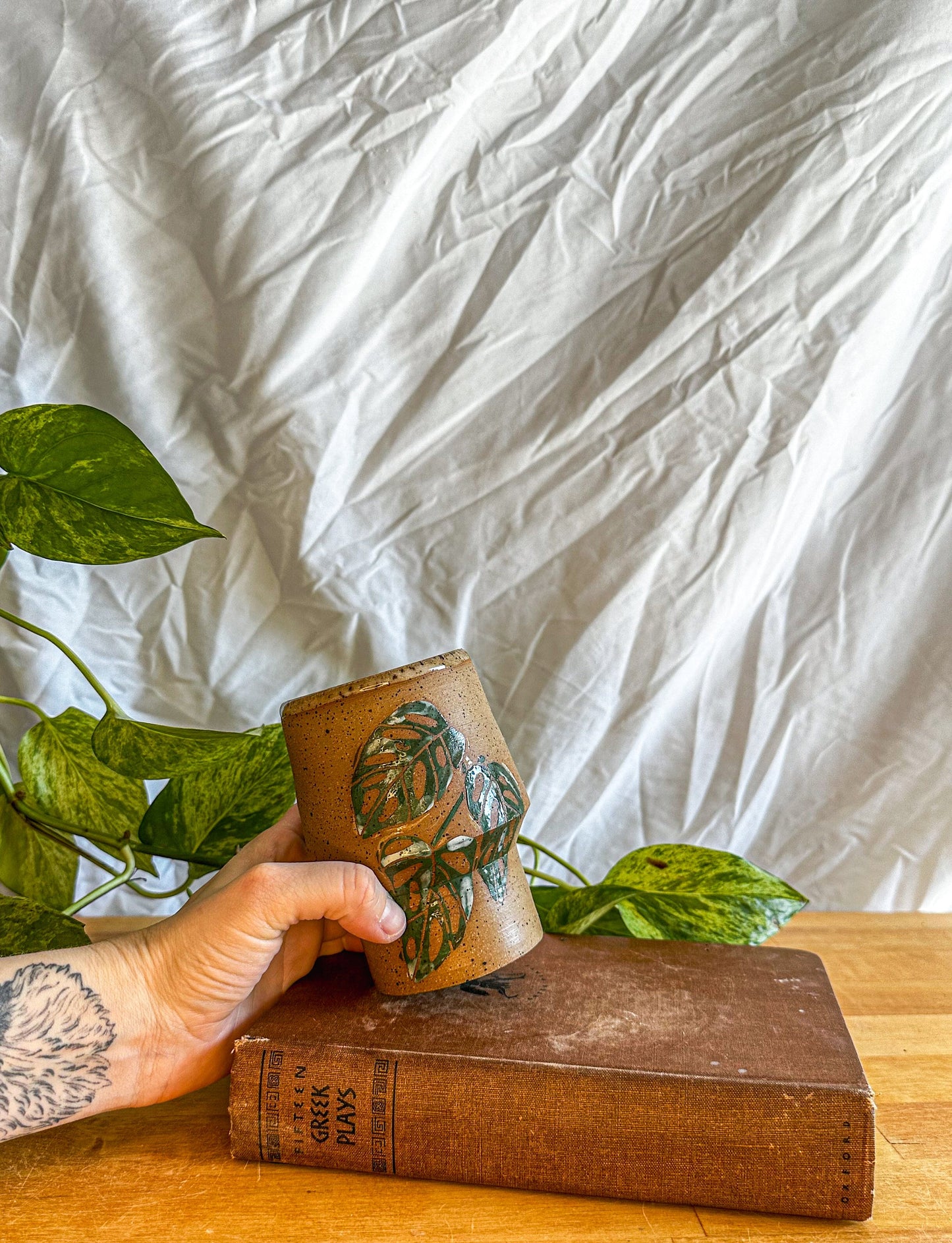 white and green monstera travel mug