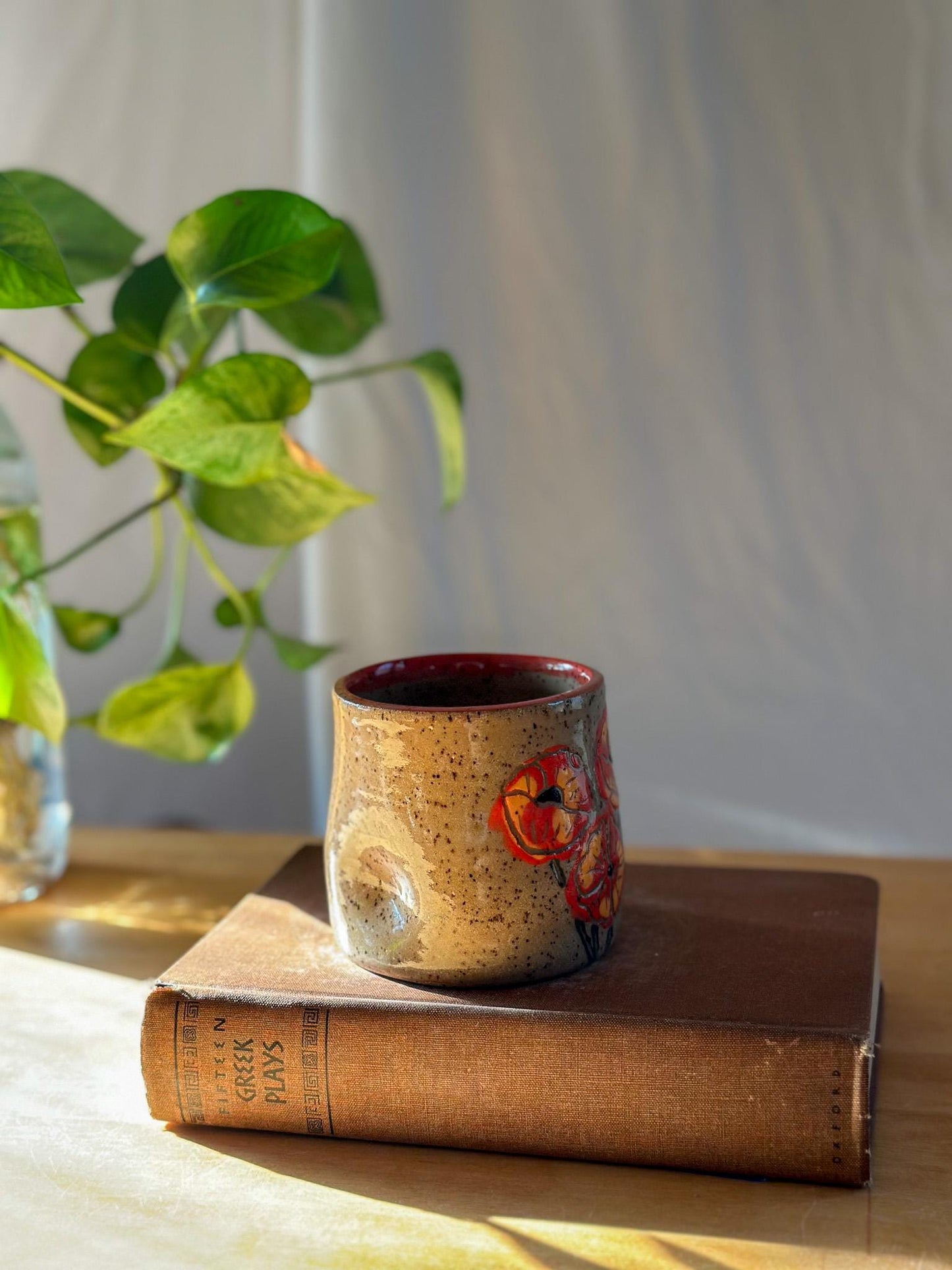 carved poppy flower free palestine ceramic thumb indent mug