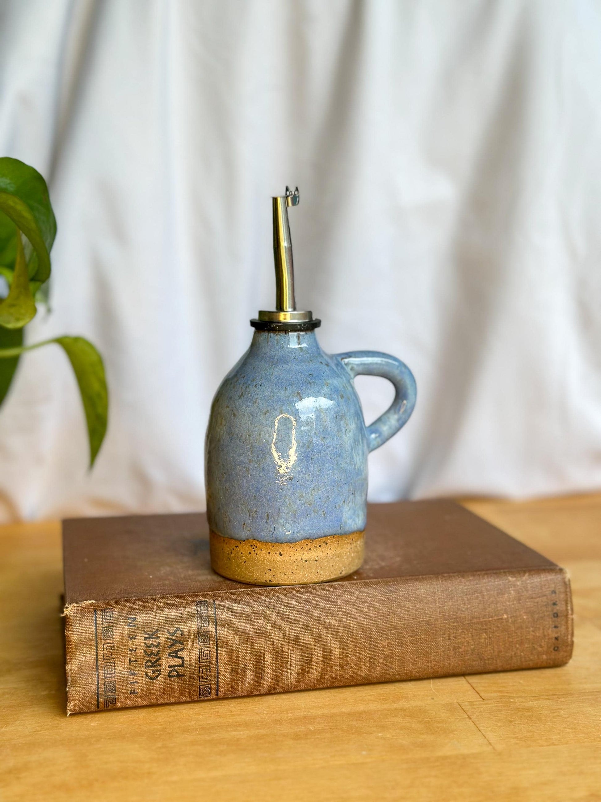 blue and brown oil bottle