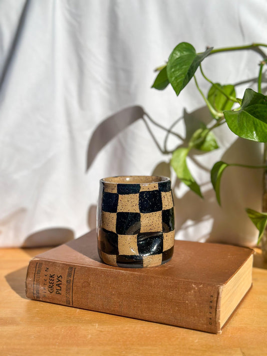 black and brown checkered mug