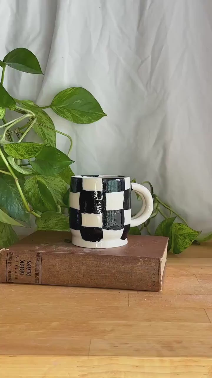 black and white checkered hand made pottery mug